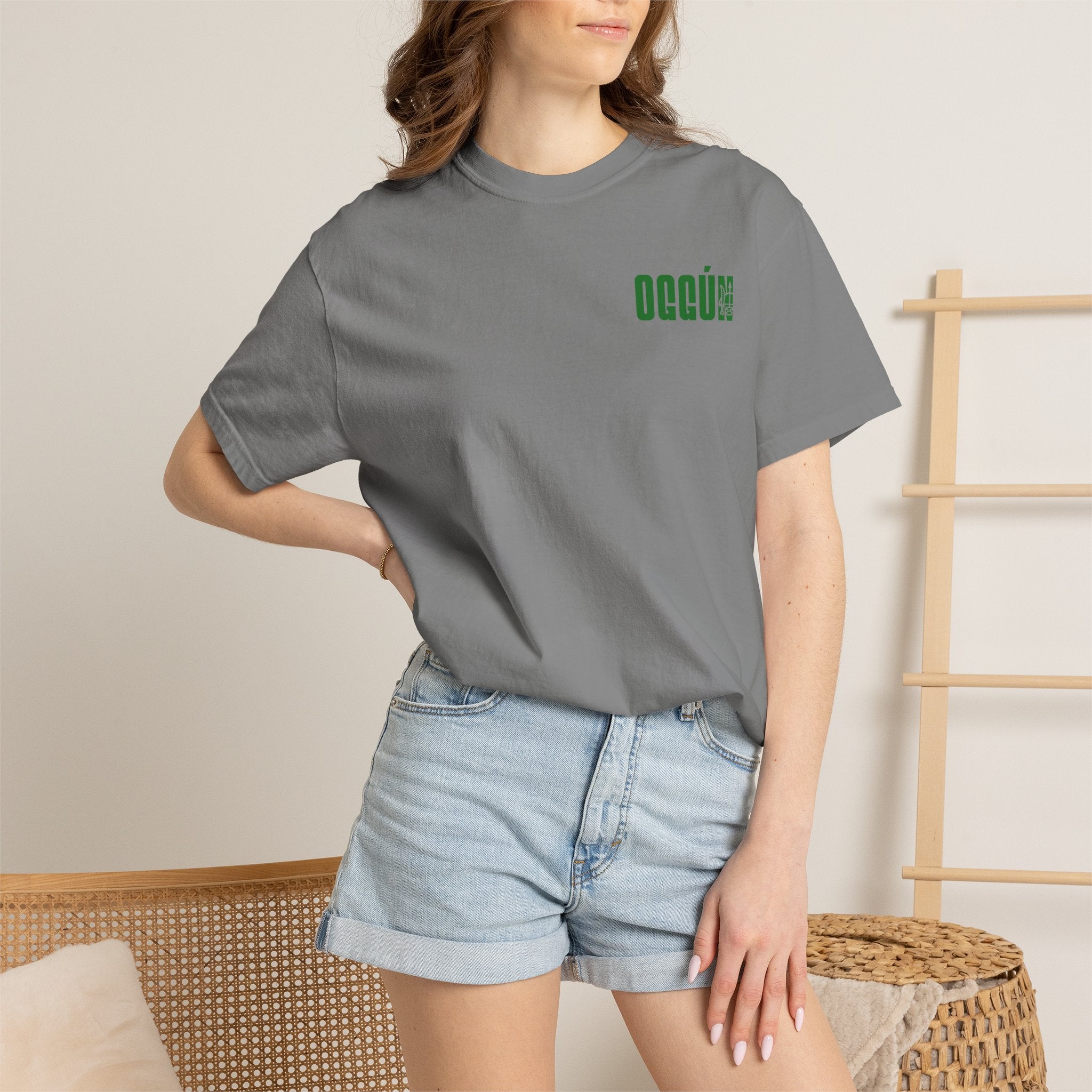 Oggún warrior illustration T-shirt | Afro-Caribbean deity art, green back print