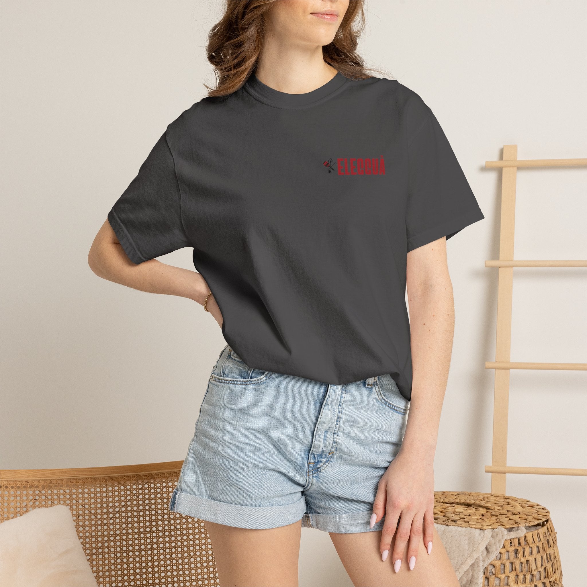 Elegguà T-Shirt — Afro Child Illustration Tee with Repeated Text Back Print