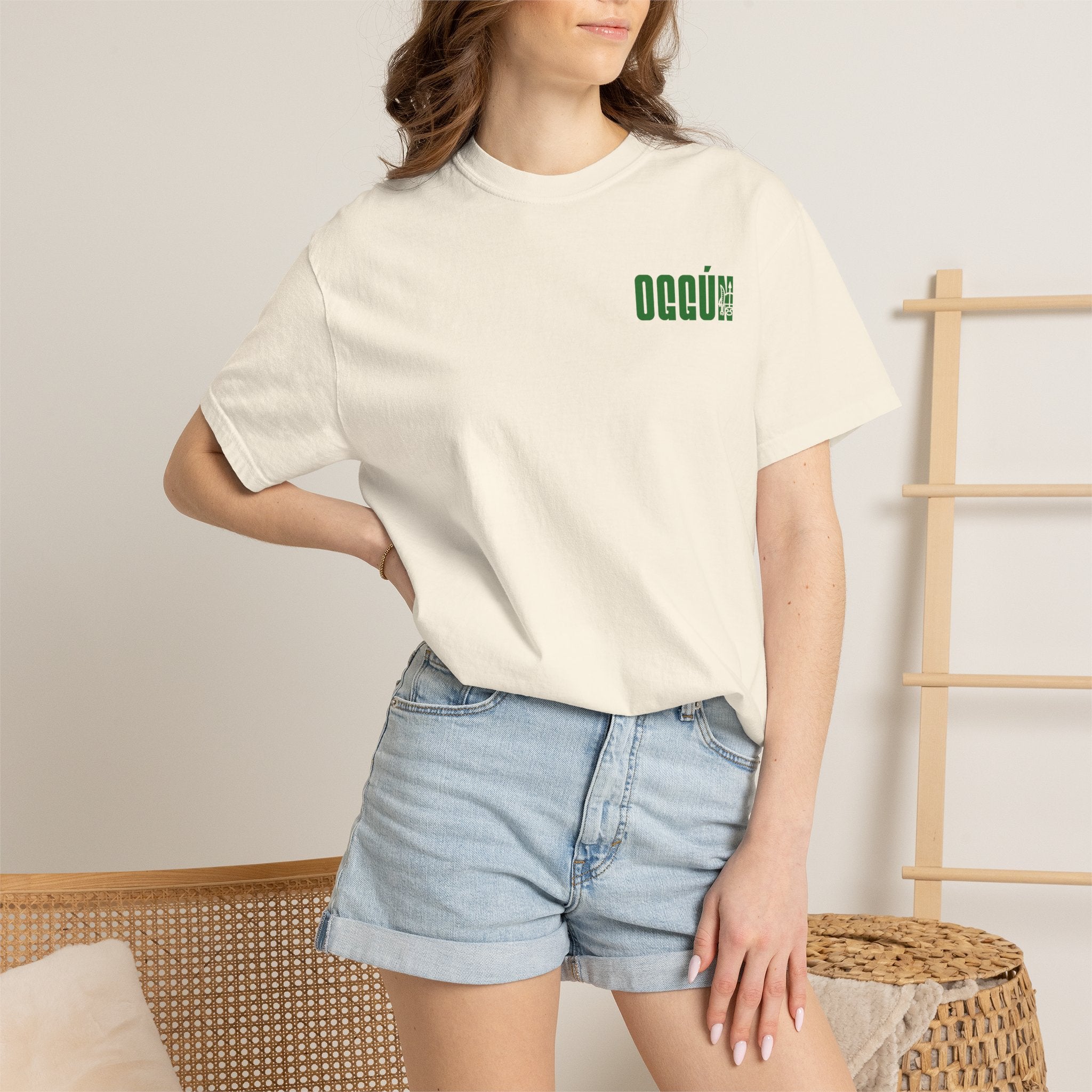 Oggún warrior illustration T-shirt | Afro-Caribbean deity art, green back print