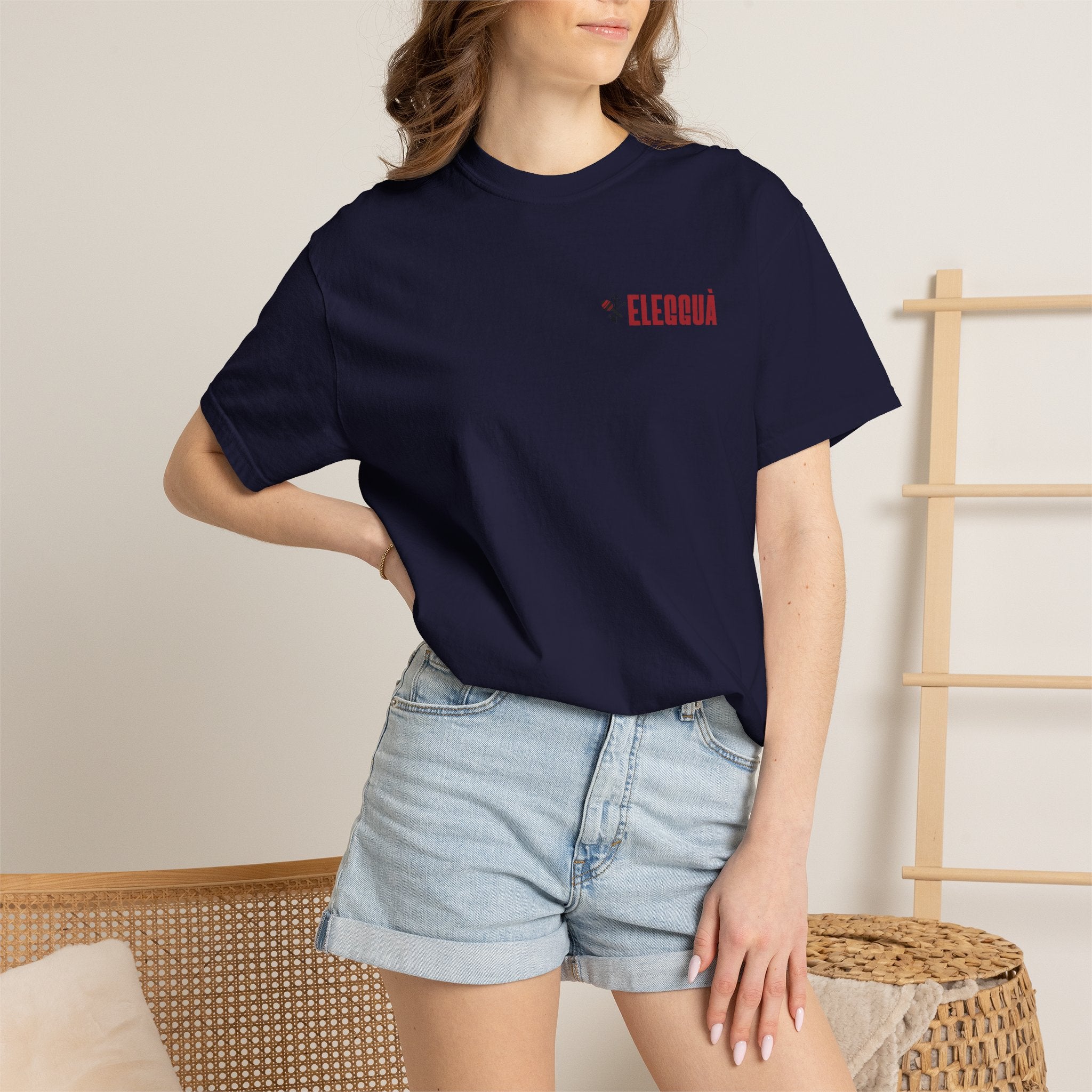 Elegguà T-Shirt — Afro Child Illustration Tee with Repeated Text Back Print