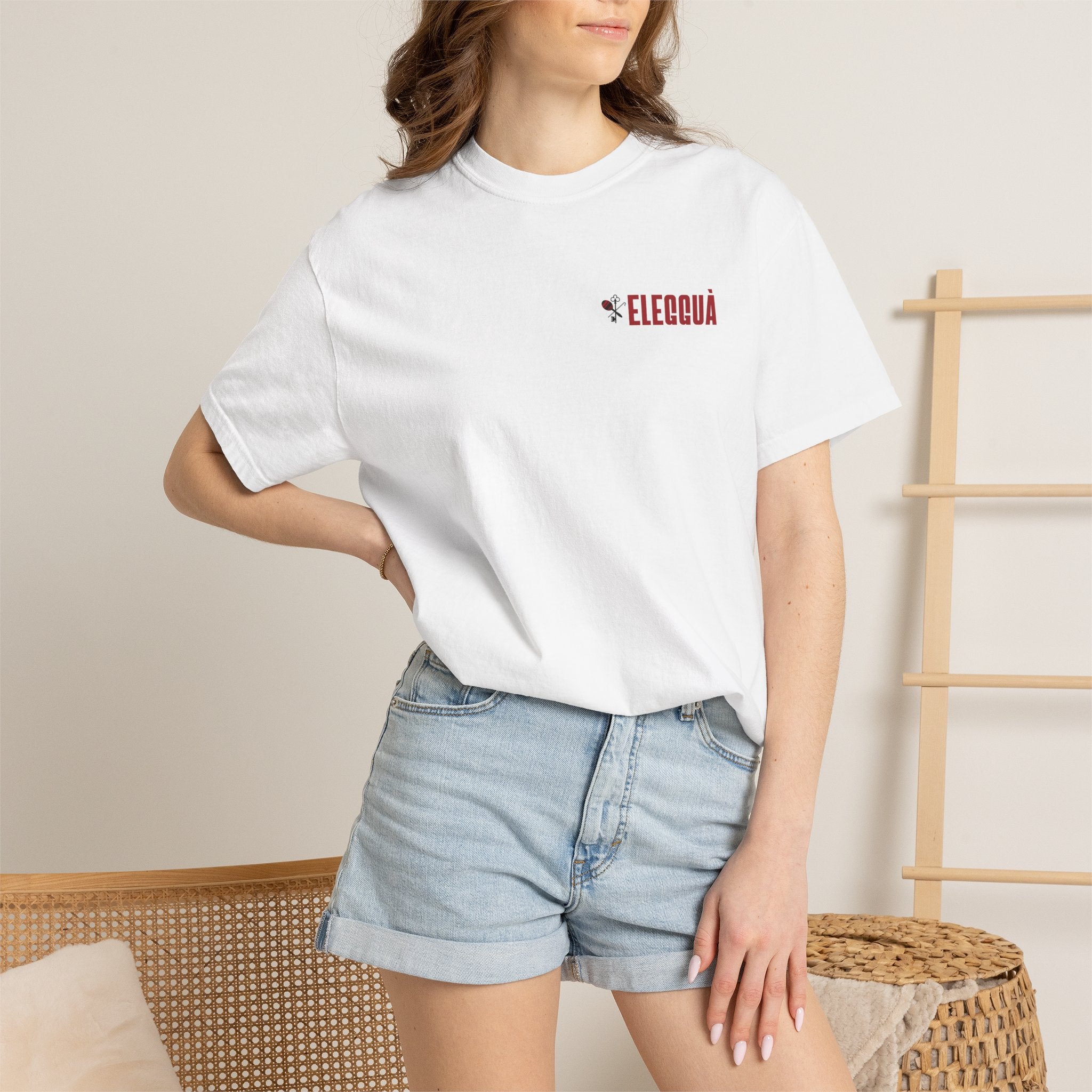 Elegguà T-Shirt — Afro Child Illustration Tee with Repeated Text Back Print
