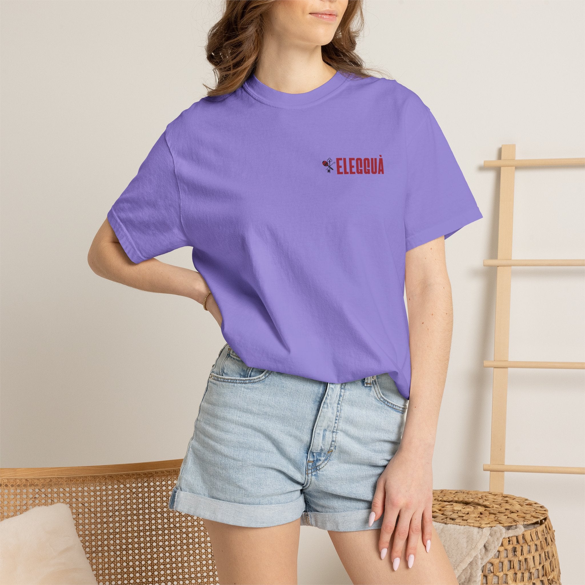 Elegguà T-Shirt — Afro Child Illustration Tee with Repeated Text Back Print