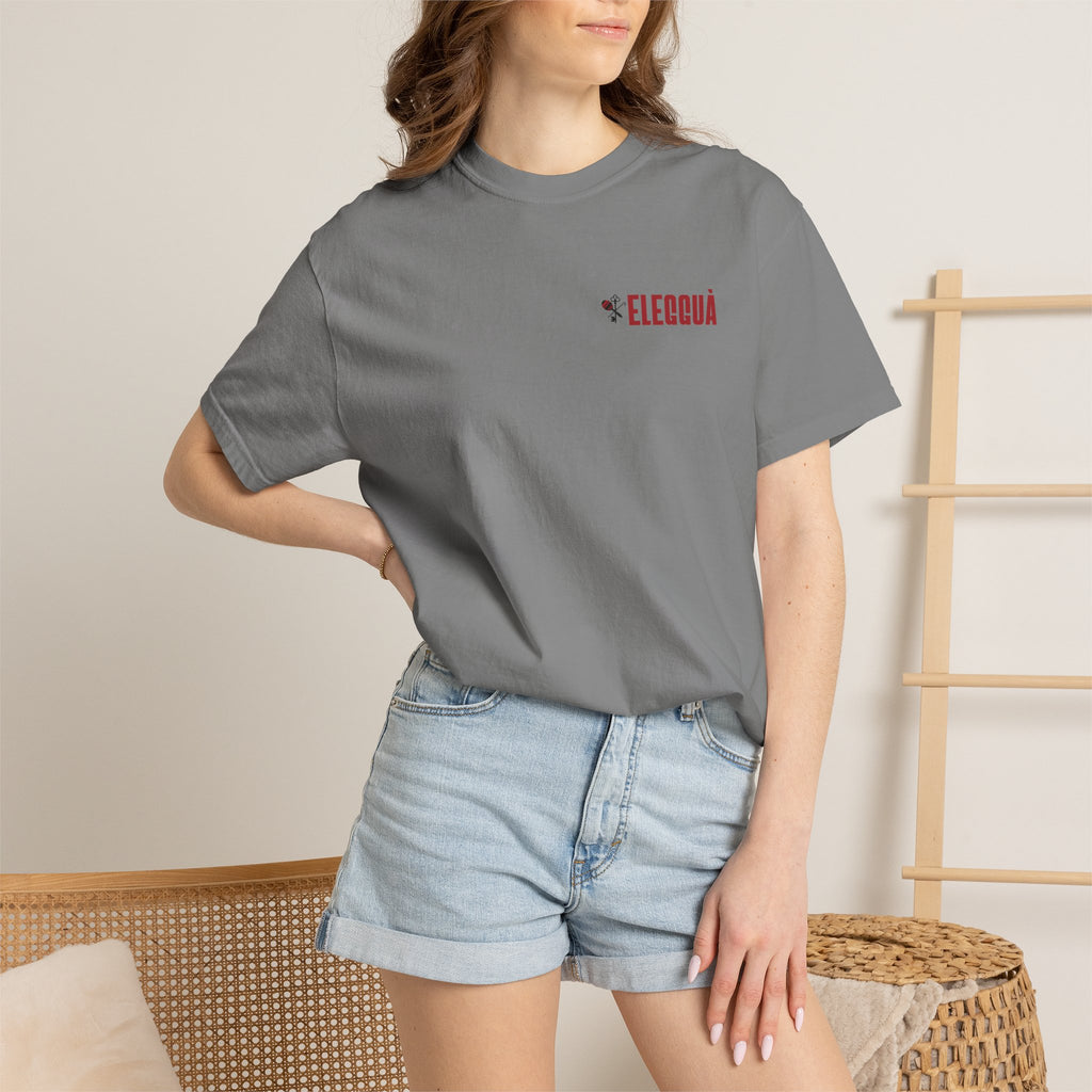 Elegguà T-Shirt — Afro Child Illustration Tee with Repeated Text Back Print